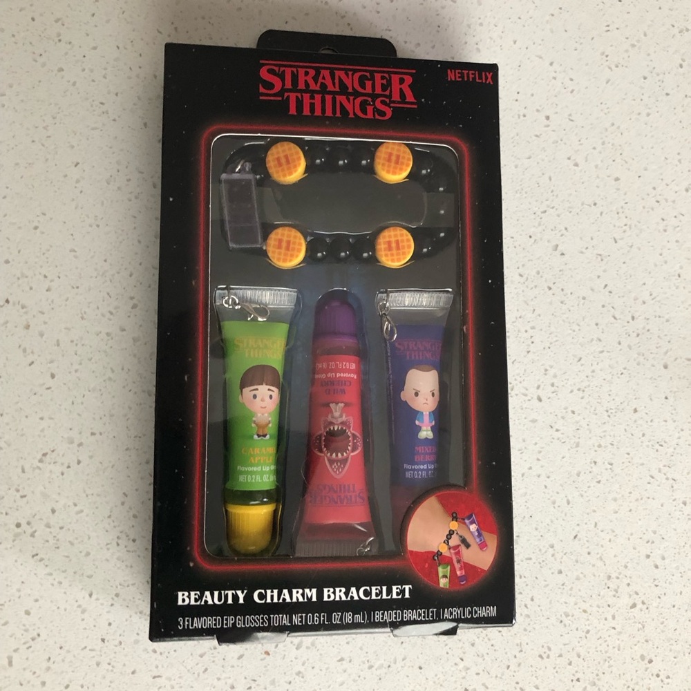 Stranger Things Beauty Charm Bracelet with three Lip Gloss Set .0.6oz